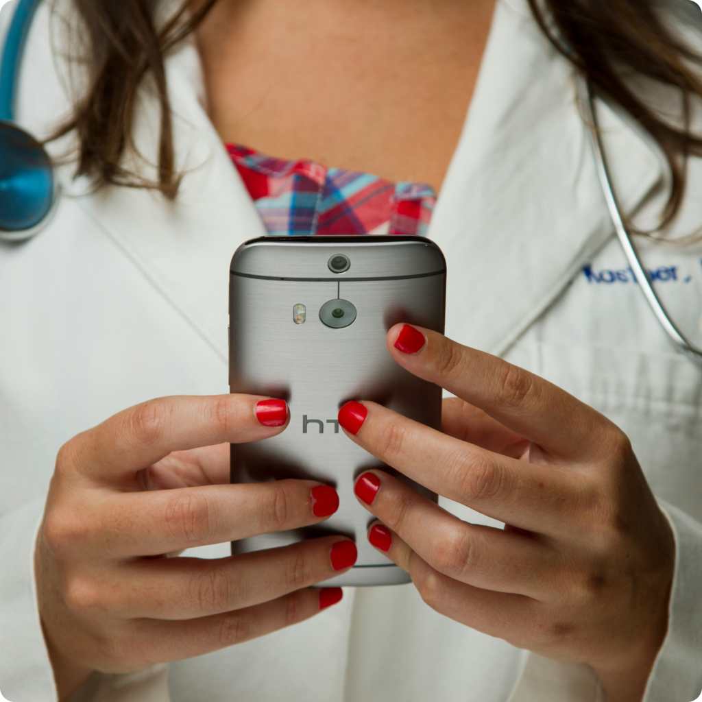 Primary care doctor consulting with patient through a telehealth appointment at Bridges Healthcare.